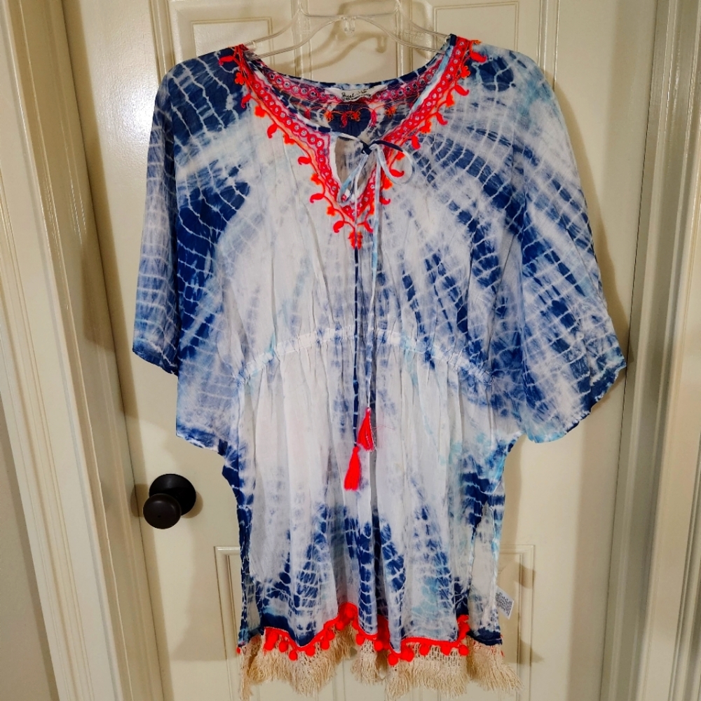 Very cute swimsuit cover.  Excellent condition.